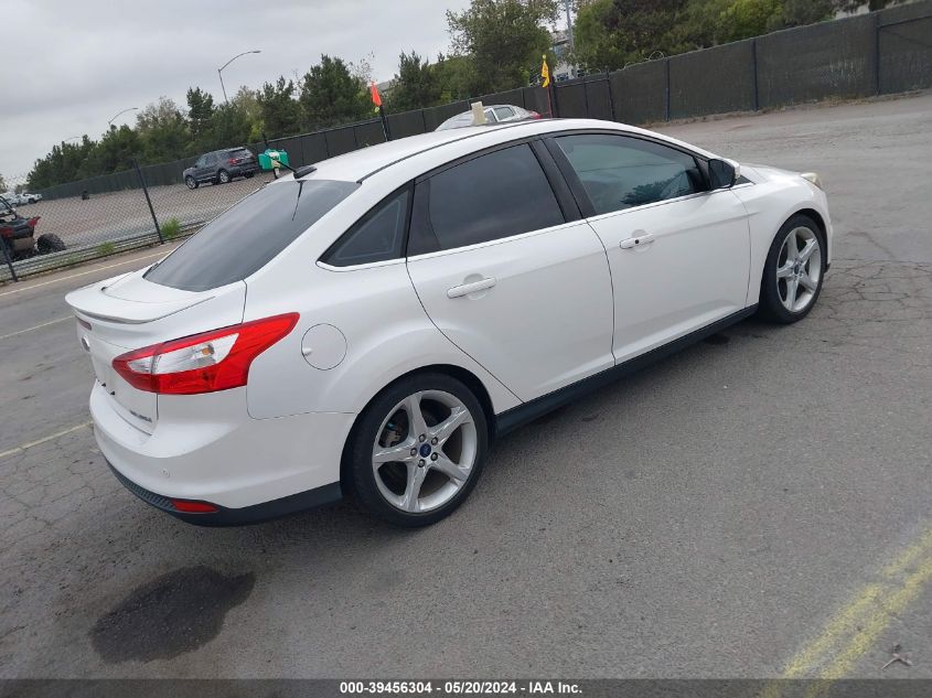 2014 Ford Focus Titanium VIN: 1FADP3J21EL300186 Lot: 39456304