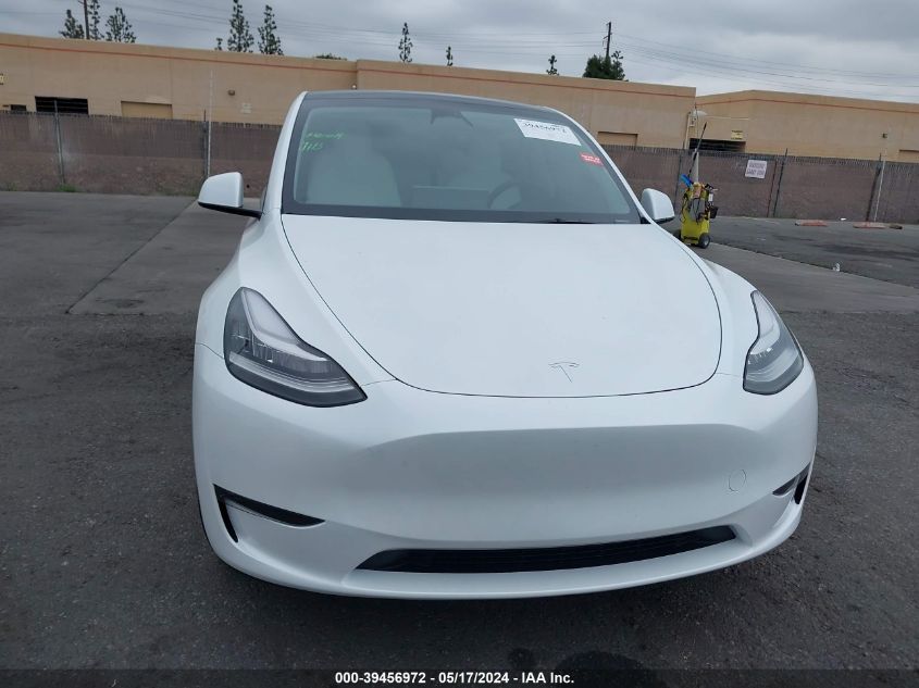 2023 Tesla Model Y Awd/Long Range Dual Motor All-Wheel Drive VIN: 7SAYGDEE1PA115986 Lot: 39456972