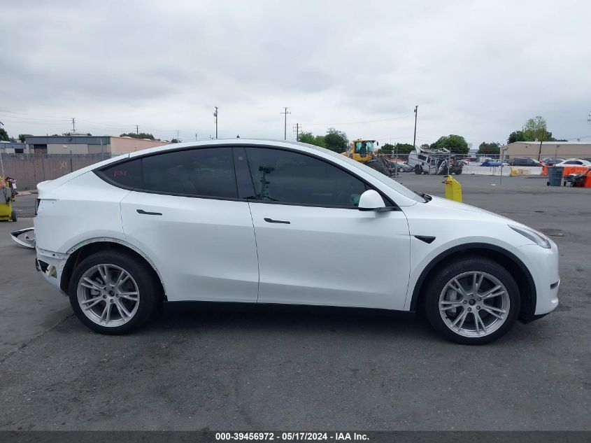 2023 Tesla Model Y Awd/Long Range Dual Motor All-Wheel Drive VIN: 7SAYGDEE1PA115986 Lot: 39456972