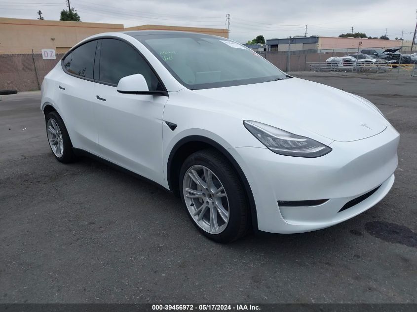 2023 Tesla Model Y Awd/Long Range Dual Motor All-Wheel Drive VIN: 7SAYGDEE1PA115986 Lot: 39456972