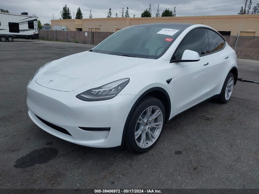 2023 Tesla Model Y Awd/Long Range Dual Motor All-Wheel Drive VIN: 7SAYGDEE1PA115986 Lot: 39456972