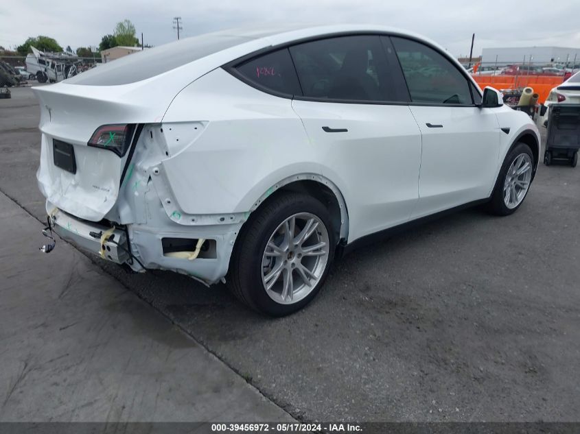 2023 Tesla Model Y Awd/Long Range Dual Motor All-Wheel Drive VIN: 7SAYGDEE1PA115986 Lot: 39456972