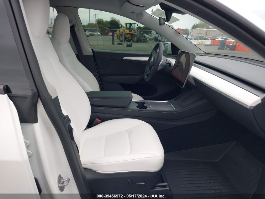 2023 Tesla Model Y Awd/Long Range Dual Motor All-Wheel Drive VIN: 7SAYGDEE1PA115986 Lot: 39456972