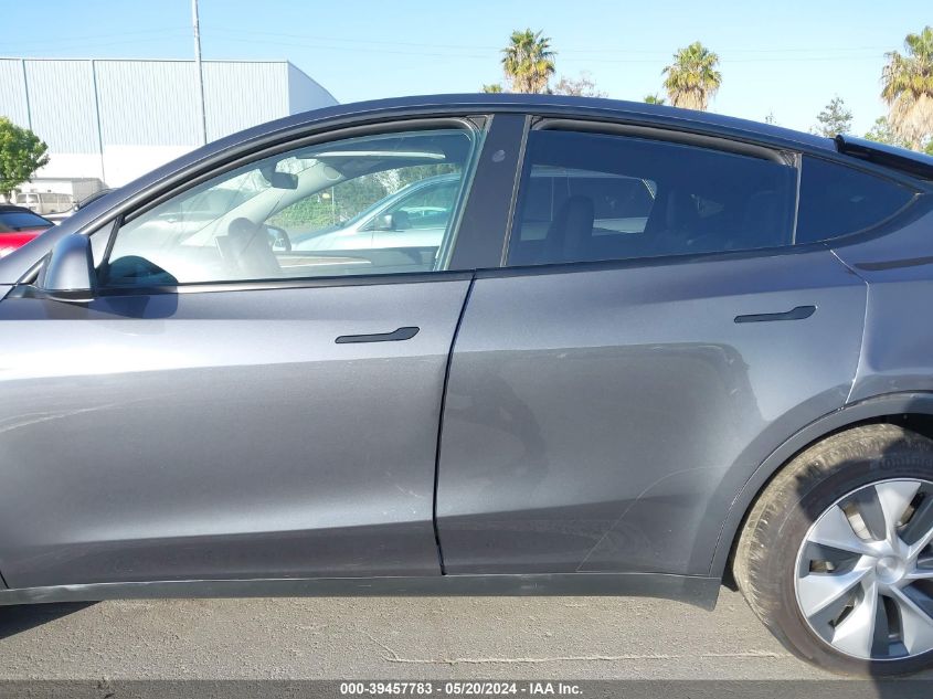 2023 Tesla Model Y Awd/Long Range Dual Motor All-Wheel Drive VIN: 7SAYGDEE9PF978201 Lot: 39457783