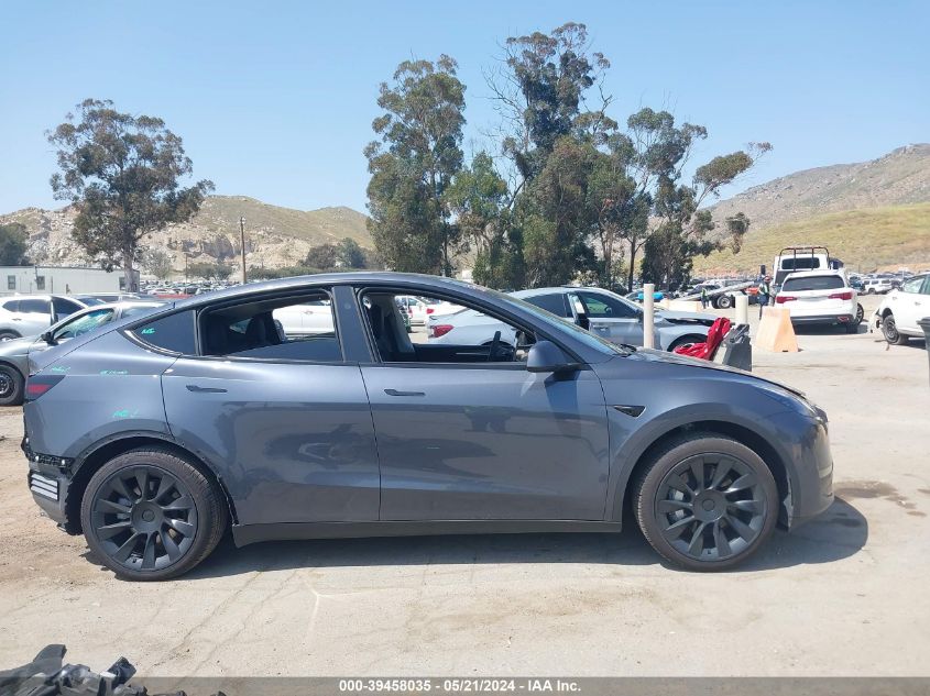 2023 Tesla Model Y Awd/Long Range Dual Motor All-Wheel Drive VIN: 7SAYGDEE5PA201169 Lot: 39458035