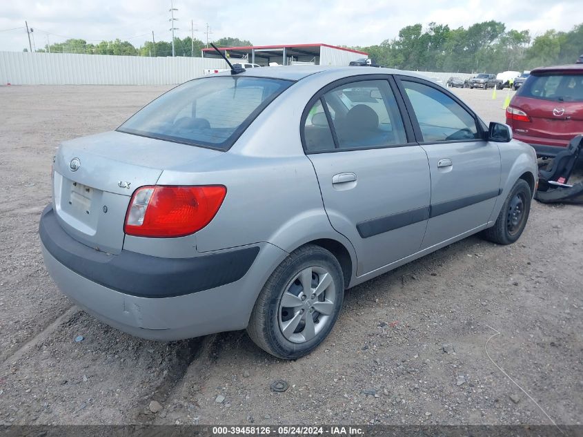 2009 Kia Rio Lx VIN: KNADE223196447126 Lot: 39458126