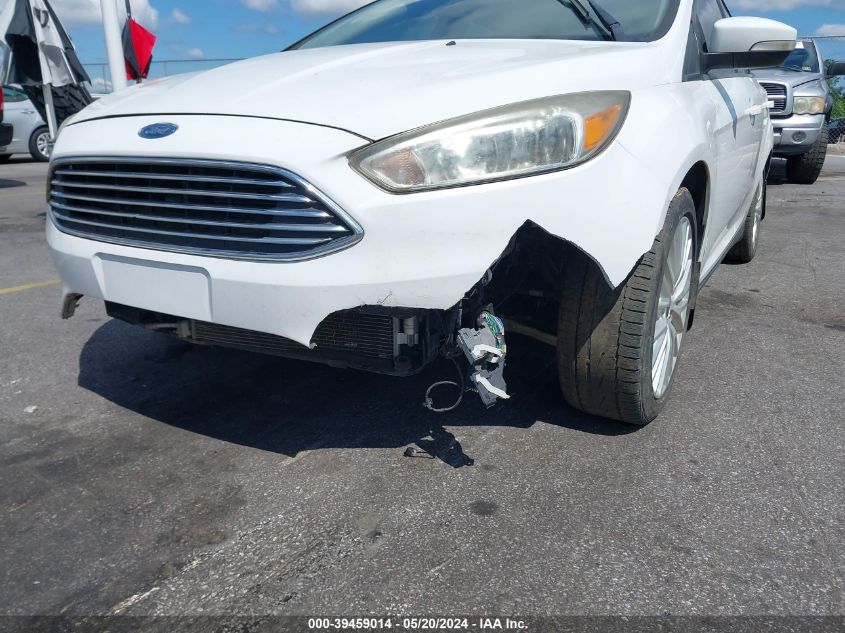 2017 Ford Focus Se VIN: 1FADP3FE3HL305865 Lot: 39459014