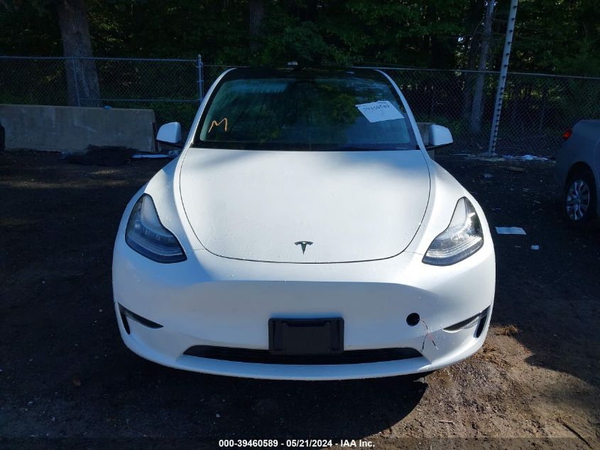 2023 Tesla Model Y Awd/Long Range Dual Motor All-Wheel Drive VIN: 7SAYGDEEXPA106235 Lot: 39460589