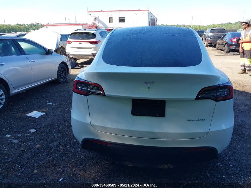 2023 Tesla Model Y Awd/Long Range Dual Motor All-Wheel Drive VIN: 7SAYGDEEXPA106235 Lot: 39460589