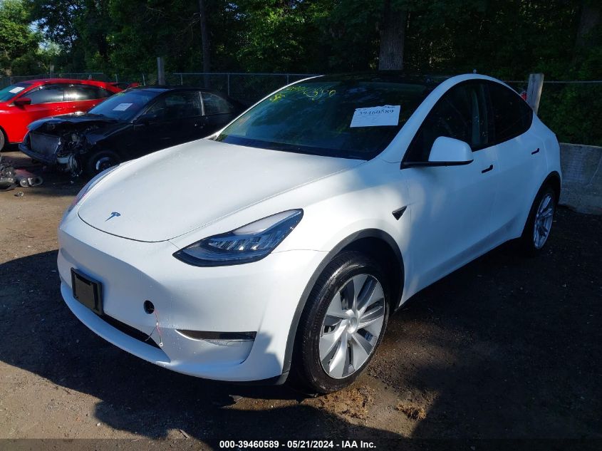 2023 Tesla Model Y Awd/Long Range Dual Motor All-Wheel Drive VIN: 7SAYGDEEXPA106235 Lot: 39460589