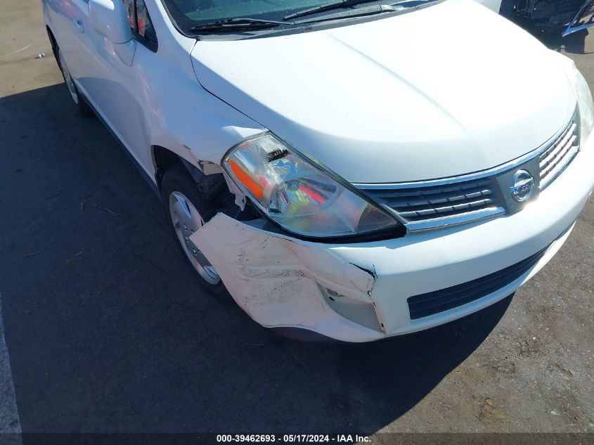 2009 Nissan Versa 1.8S VIN: 3N1BC11E89L390932 Lot: 39462693