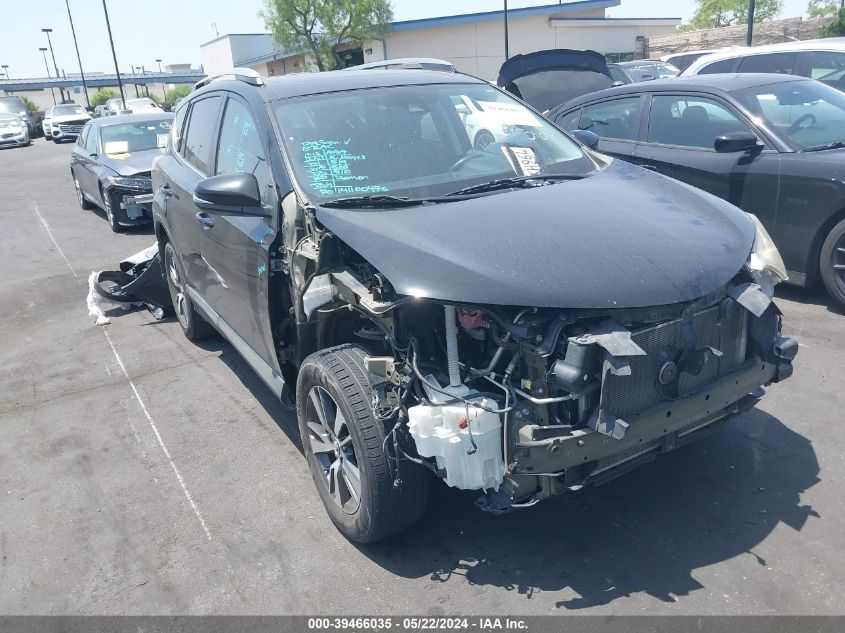 2T3RFREV8JW704085 2018 TOYOTA RAV 4 - Image 1