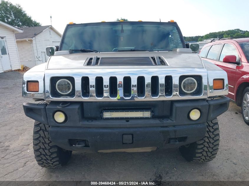 2003 Hummer H2 VIN: 5GRGN23U13H116239 Lot: 39468424