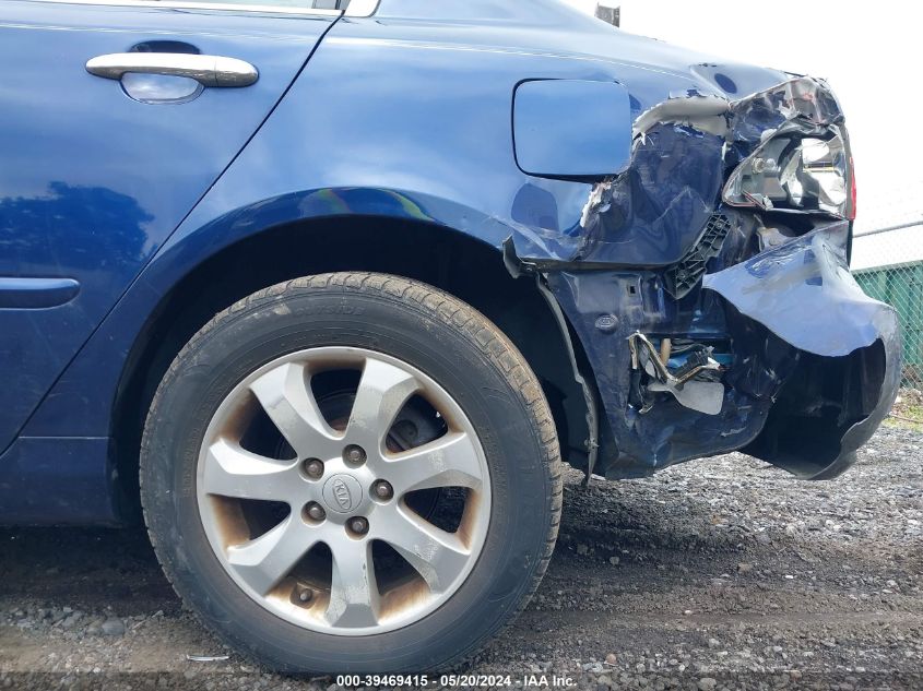 2007 Kia Optima Ex VIN: KNAGE123275101175 Lot: 39469415