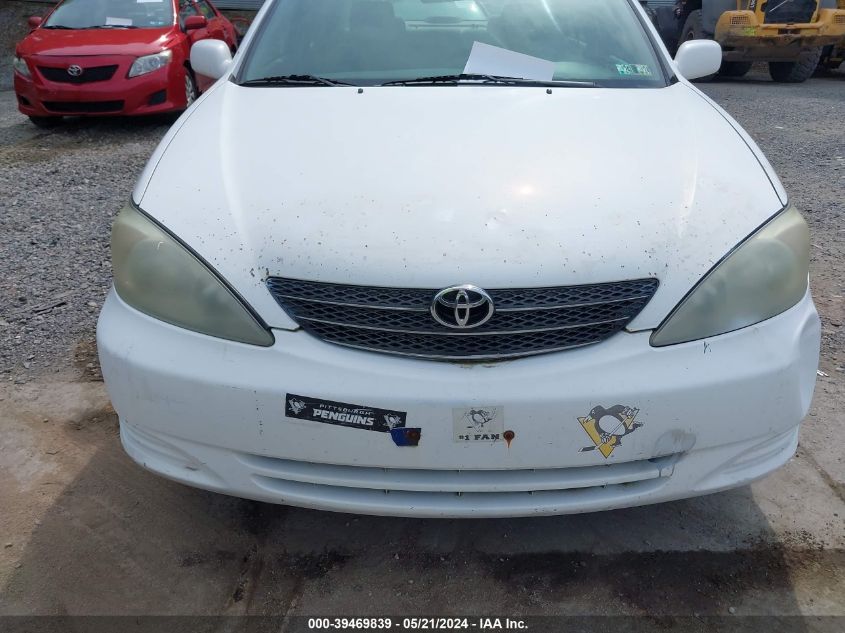 2004 Toyota Camry Le VIN: 4T1BE32K74U318847 Lot: 39469839