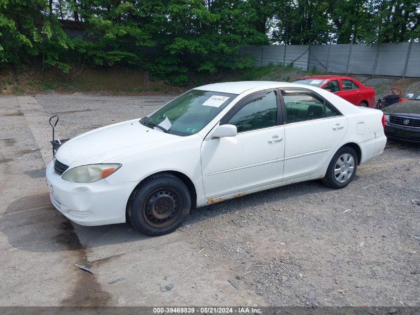 2004 Toyota Camry Le VIN: 4T1BE32K74U318847 Lot: 39469839