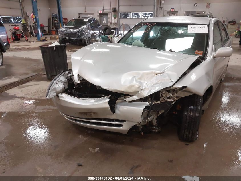 2004 Toyota Camry Le V6 VIN: 4T1BF32K74U589291 Lot: 39470102