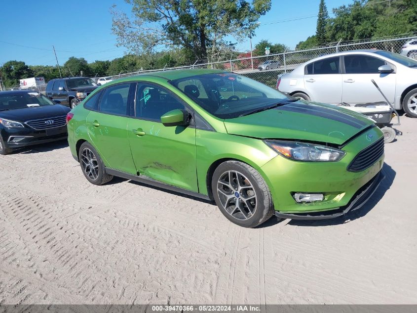 2018 Ford Focus Se VIN: 1FADP3FE0JL275472 Lot: 39470366