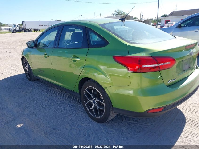 2018 Ford Focus Se VIN: 1FADP3FE0JL275472 Lot: 39470366