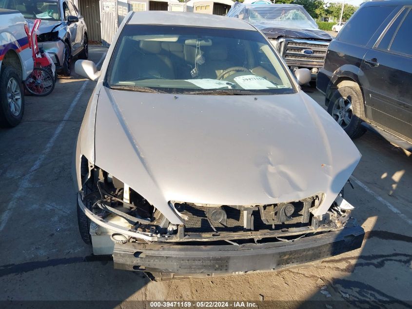 2003 Toyota Camry Le V6 VIN: 4T1BF32KX3U557675 Lot: 39471159