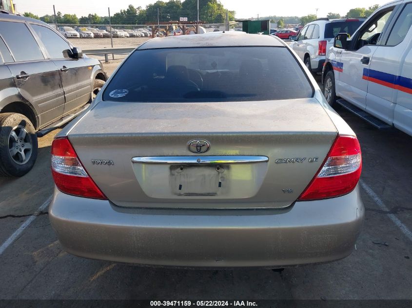 2003 Toyota Camry Le V6 VIN: 4T1BF32KX3U557675 Lot: 39471159