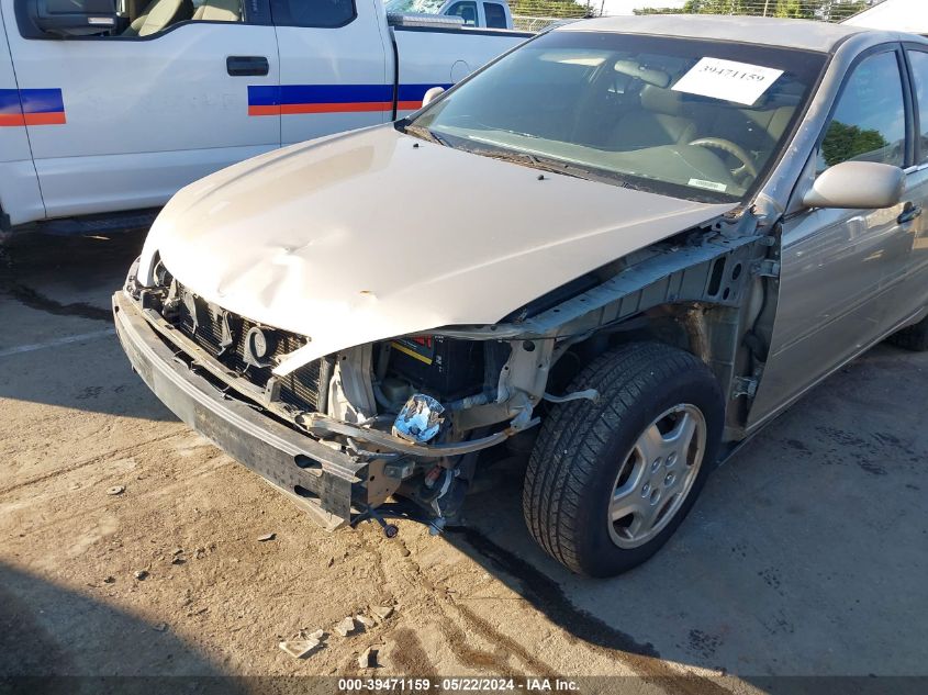 2003 Toyota Camry Le V6 VIN: 4T1BF32KX3U557675 Lot: 39471159