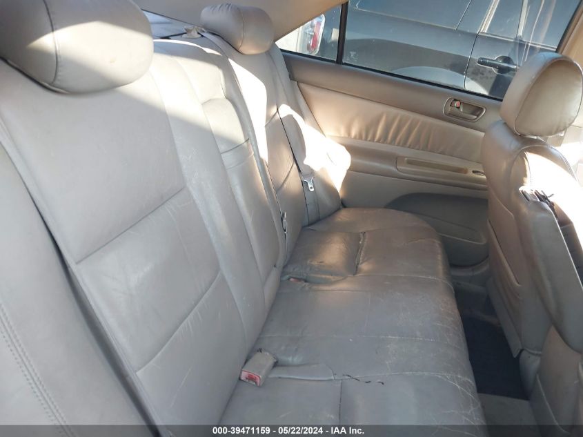 2003 Toyota Camry Le V6 VIN: 4T1BF32KX3U557675 Lot: 39471159