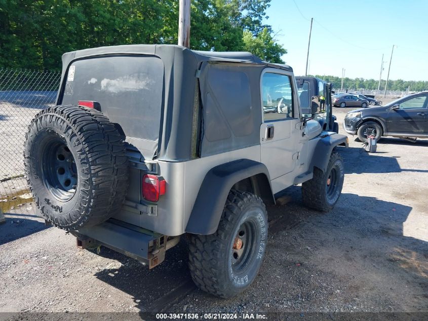 2001 Jeep Wrangler Sport VIN: 1J4FA49S61P323135 Lot: 39471536