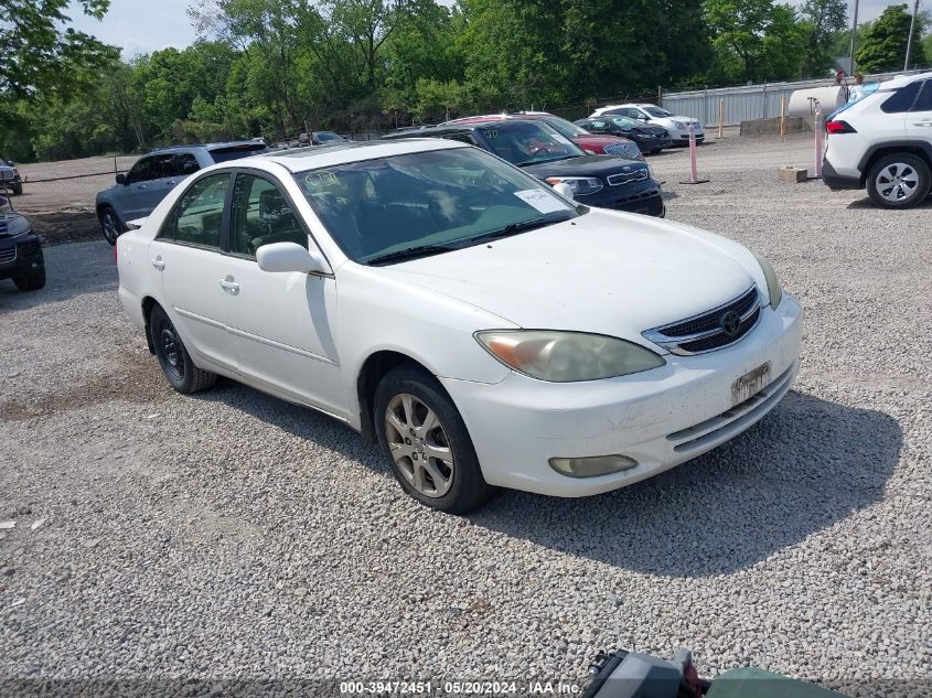 2004 Toyota Camry Le VIN: JTDBE32K940250157 Lot: 39472451