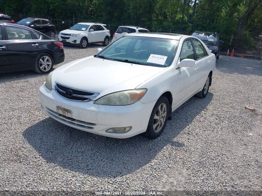 2004 Toyota Camry Le VIN: JTDBE32K940250157 Lot: 39472451