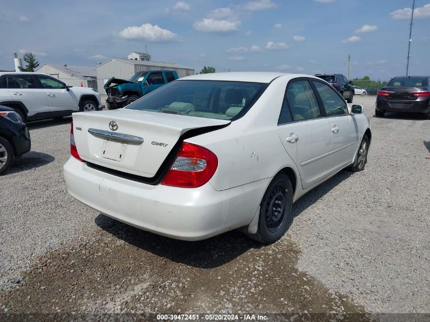 2004 Toyota Camry Le VIN: JTDBE32K940250157 Lot: 39472451