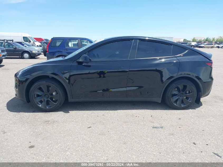 2023 Tesla Model Y Awd/Long Range Dual Motor All-Wheel Drive VIN: 7SAYGDEE1PF902147 Lot: 39473293