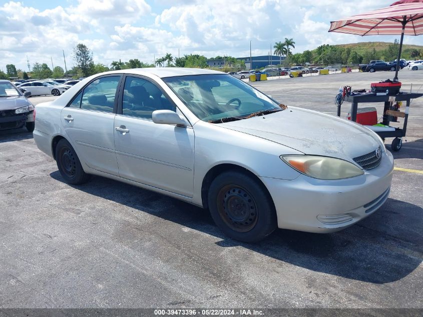 2002 Toyota Camry Le VIN: 4T1BE32K32U038906 Lot: 39473396