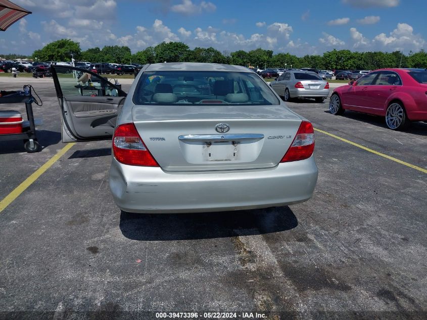 2002 Toyota Camry Le VIN: 4T1BE32K32U038906 Lot: 39473396