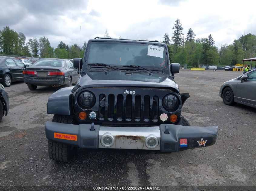 2009 Jeep Wrangler Unlimited Sahara VIN: 1J8GA59129L703768 Lot: 39473781