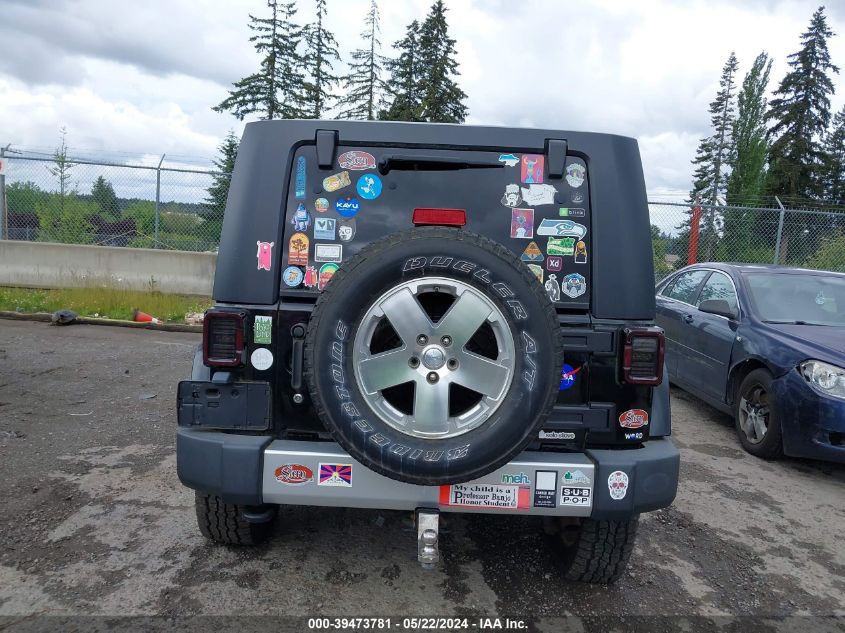 2009 Jeep Wrangler Unlimited Sahara VIN: 1J8GA59129L703768 Lot: 39473781