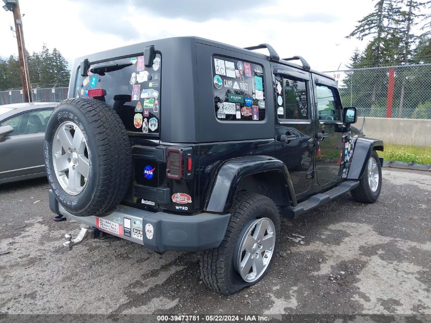 2009 Jeep Wrangler Unlimited Sahara VIN: 1J8GA59129L703768 Lot: 39473781