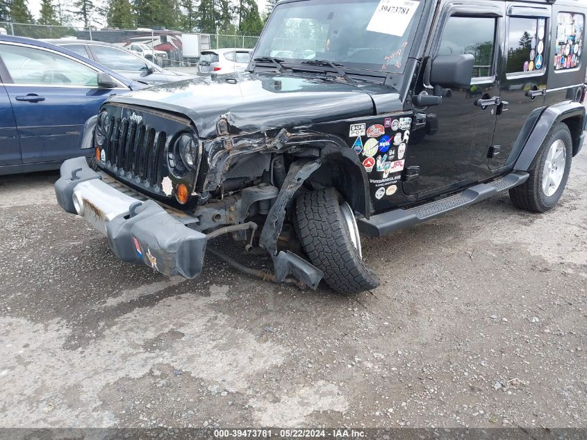 2009 Jeep Wrangler Unlimited Sahara VIN: 1J8GA59129L703768 Lot: 39473781