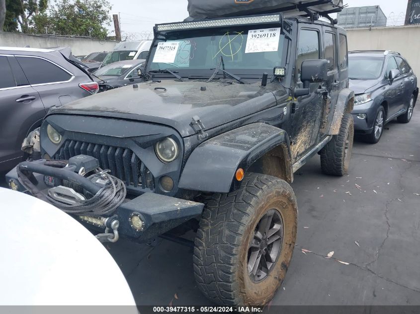 2013 Jeep Wrangler Unlimited Freedom Edition VIN: 1C4BJWDGXDL602540 Lot: 39477315