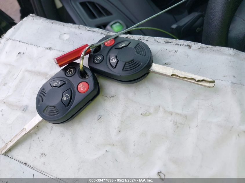 2015 Ford Focus Se VIN: 1FADP3F23FL374395 Lot: 39477696