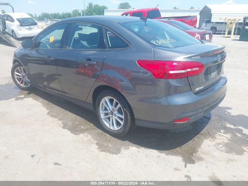 VIN 1FADP3F21JL318707 2018 FORD FOCUS SE