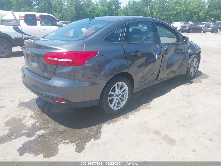 VIN 1FADP3F21JL318707 2018 FORD FOCUS SE