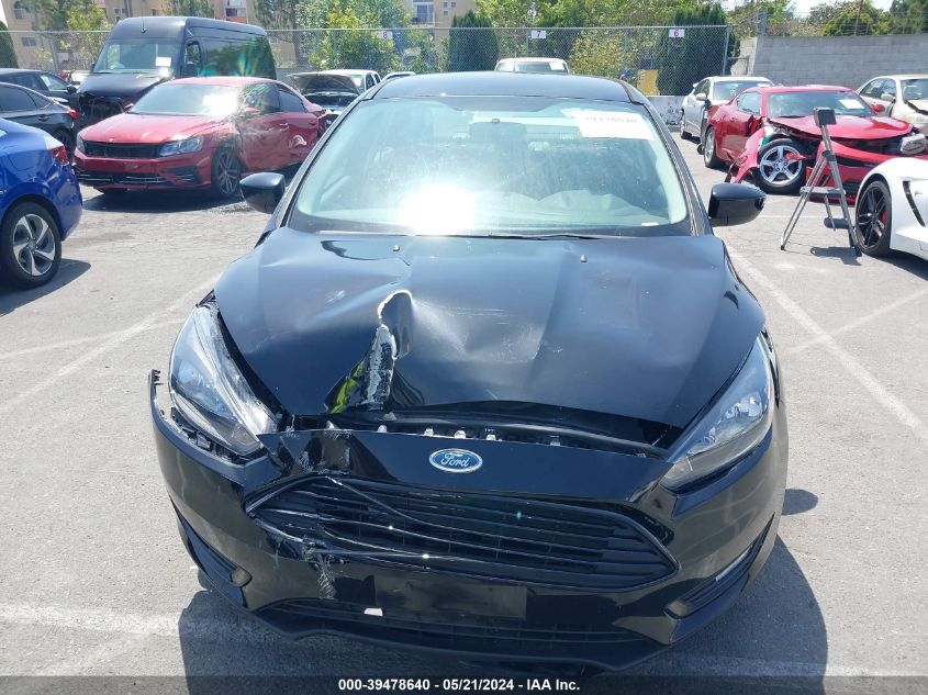 2018 Ford Focus Se VIN: 1FADP3FE4JL331283 Lot: 39478640