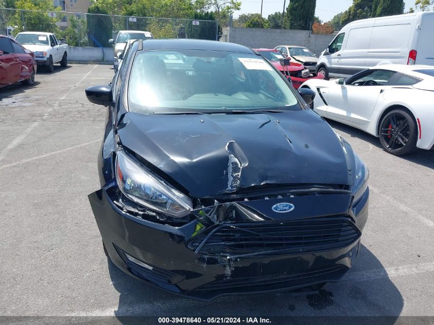 2018 Ford Focus Se VIN: 1FADP3FE4JL331283 Lot: 39478640