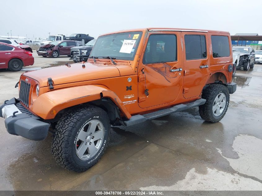 2011 Jeep Wrangler Unlimited Sahara VIN: 1J4BA5H12BL606721 Lot: 39478708