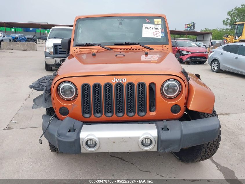 2011 Jeep Wrangler Unlimited Sahara VIN: 1J4BA5H12BL606721 Lot: 39478708