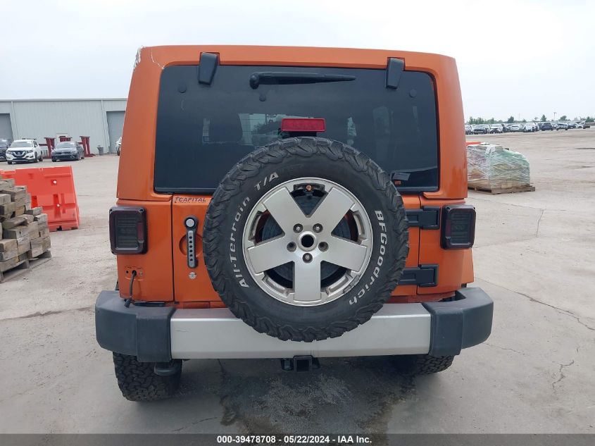 2011 Jeep Wrangler Unlimited Sahara VIN: 1J4BA5H12BL606721 Lot: 39478708