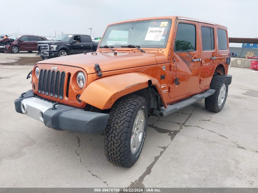 2011 Jeep Wrangler Unlimited Sahara VIN: 1J4BA5H12BL606721 Lot: 39478708