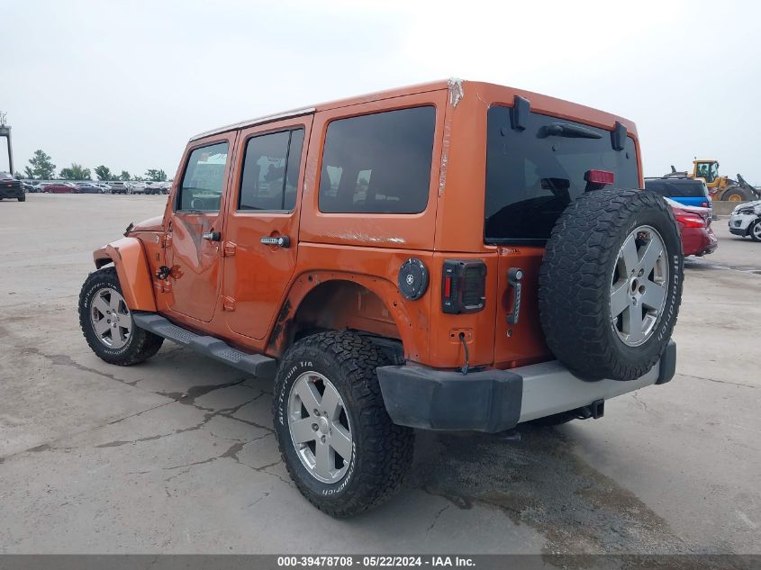 2011 Jeep Wrangler Unlimited Sahara VIN: 1J4BA5H12BL606721 Lot: 39478708