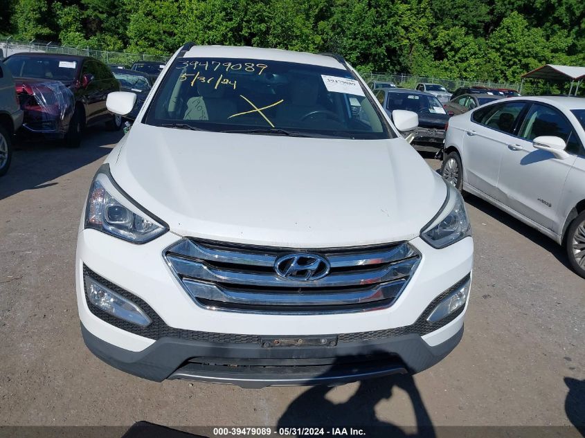 2014 Hyundai Santa Fe Sport 2.4L VIN: 5XYZUDLBXEG217296 Lot: 39479089